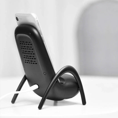 Wireless fast charging station with a stylish phone holder, designed for convenient and safe charging on a desk or table
