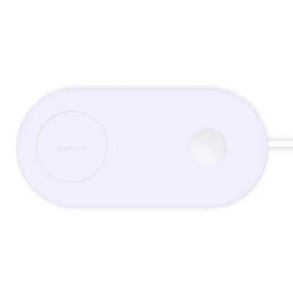 White dual wireless fast charging pad for two mobile phones on a wooden desk.