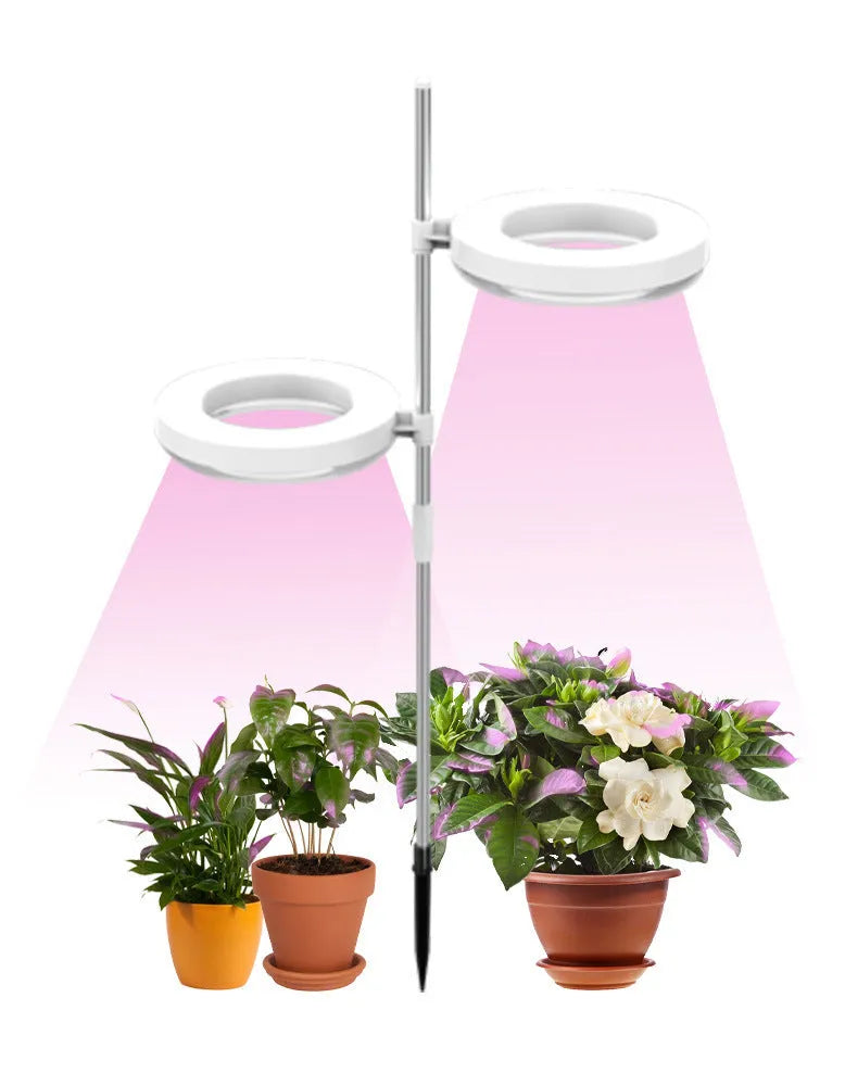 Desk plant growth lamp with full spectrum light, PC shell, and adjustable heads on 160x29mm base.