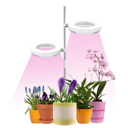 Desk plant growth lamp with full spectrum light, PC shell, and adjustable heads on 160x29mm base.