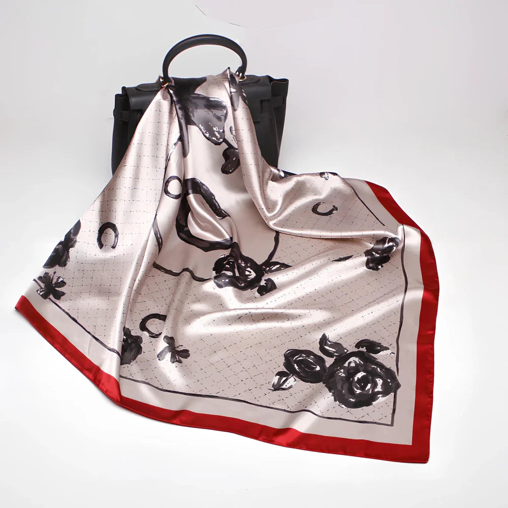 Square silk scarf with satin weave showing carriage chain pattern, measuring 90cm by 90cm