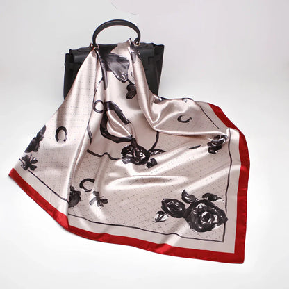 Square silk scarf with satin weave showing carriage chain pattern, measuring 90cm by 90cm