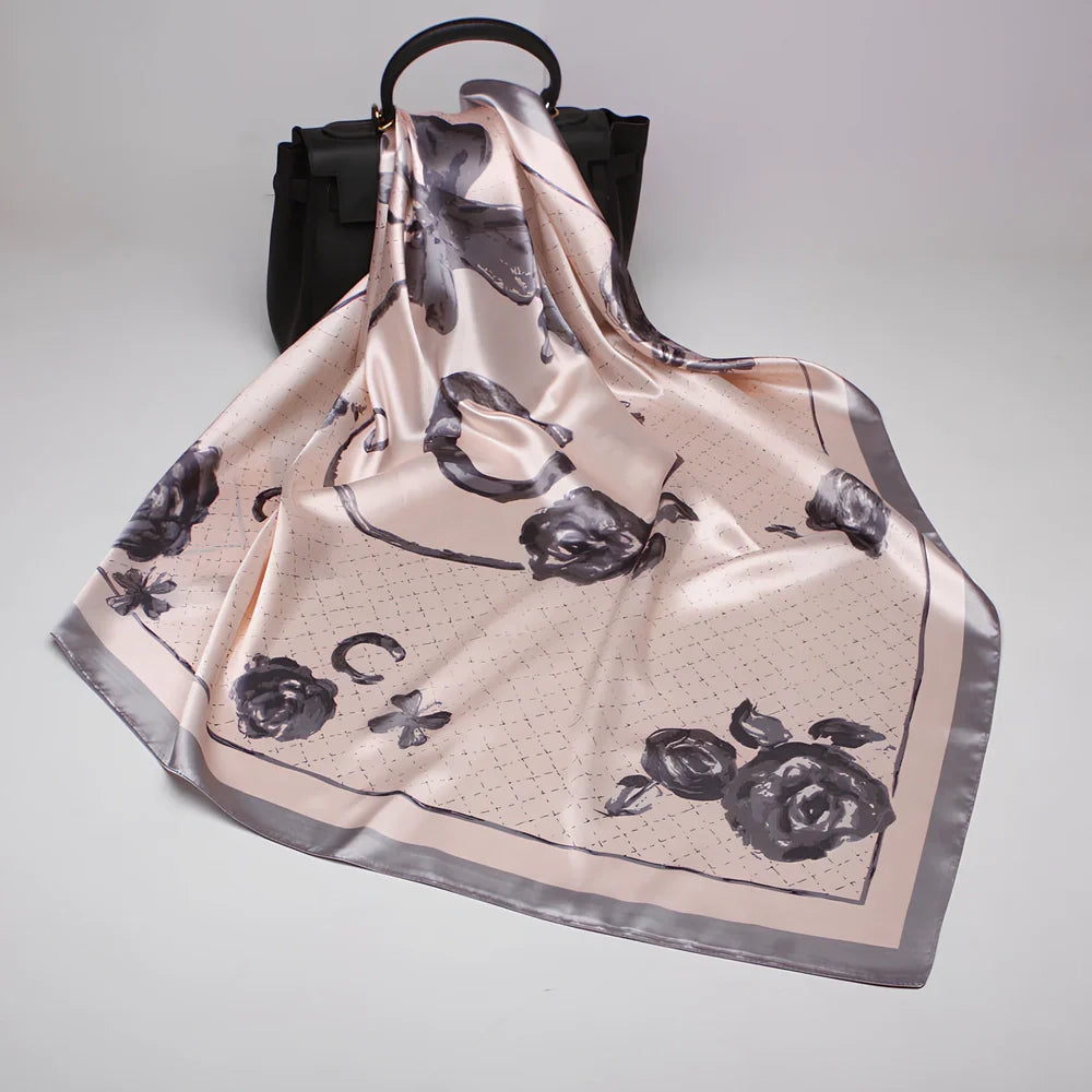 Square silk scarf with satin weave showing carriage chain pattern, measuring 90cm by 90cm