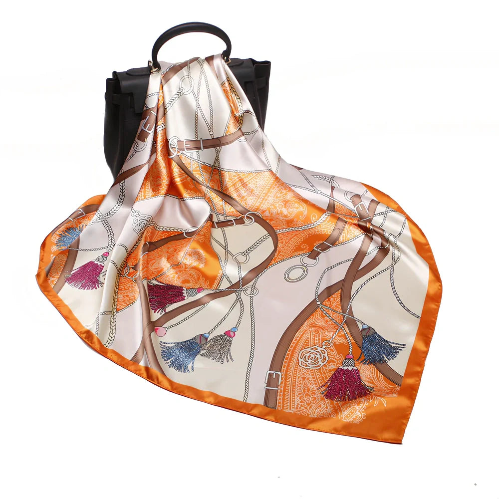 Square silk scarf with satin weave showing carriage chain pattern, measuring 90cm by 90cm