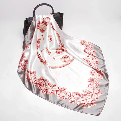Square silk scarf with satin weave showing carriage chain pattern, measuring 90cm by 90cm