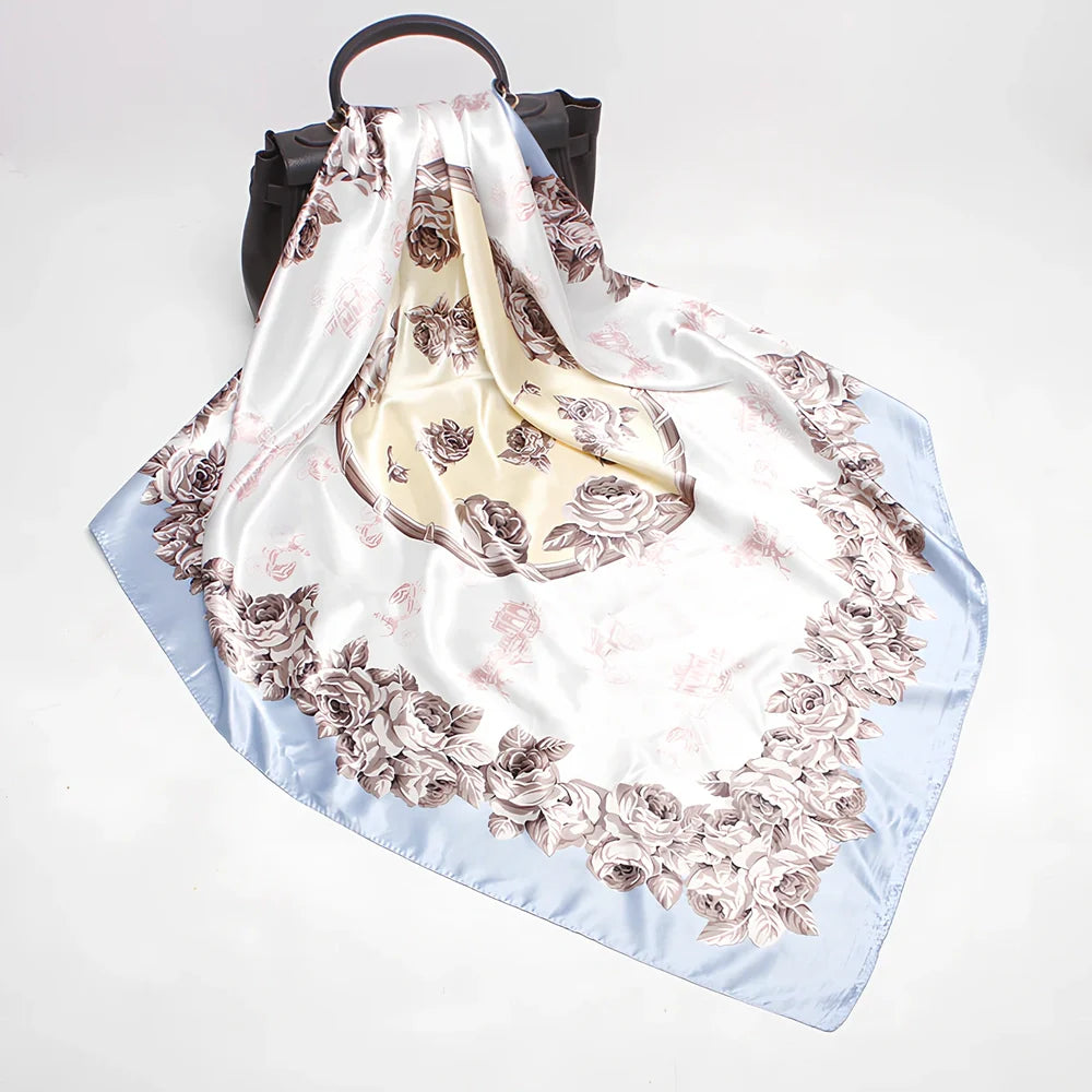 Square silk scarf with satin weave showing carriage chain pattern, measuring 90cm by 90cm