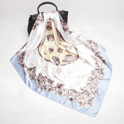 Square silk scarf with satin weave showing carriage chain pattern, measuring 90cm by 90cm