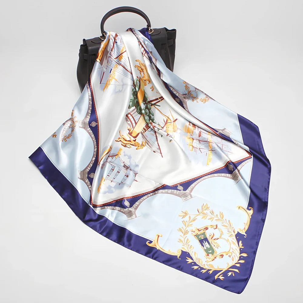 Square silk scarf with satin weave showing carriage chain pattern, measuring 90cm by 90cm