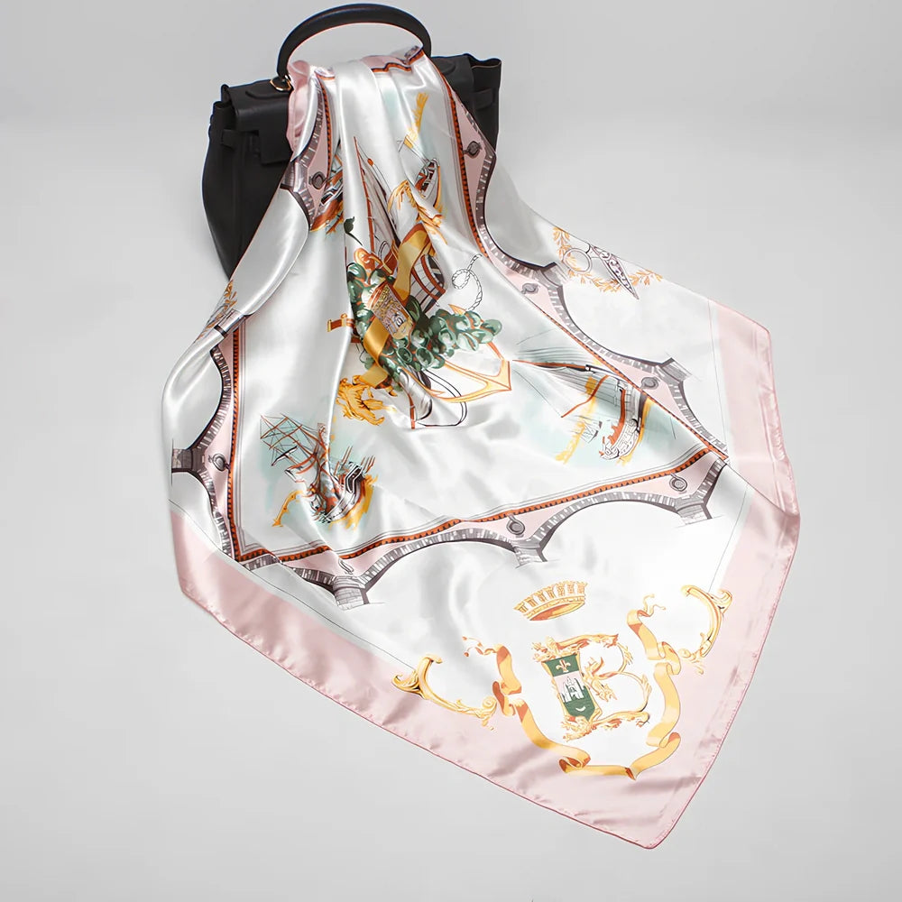 Square silk scarf with satin weave showing carriage chain pattern, measuring 90cm by 90cm