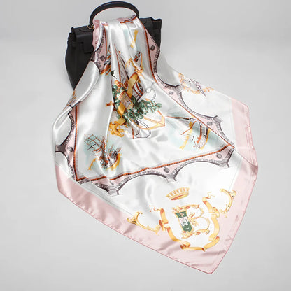 Square silk scarf with satin weave showing carriage chain pattern, measuring 90cm by 90cm