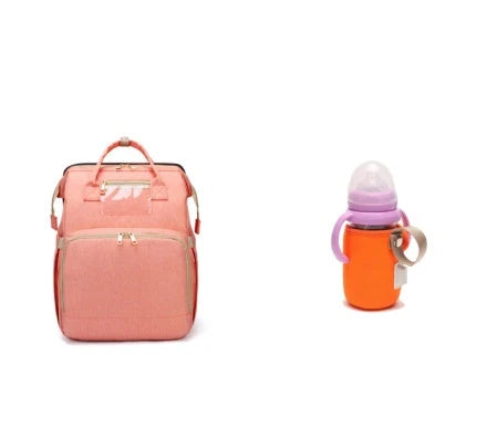 Versatile baby changing backpack with USB charging port and folding portable bed