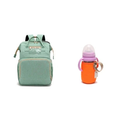 Versatile baby changing backpack with USB charging port and folding portable bed