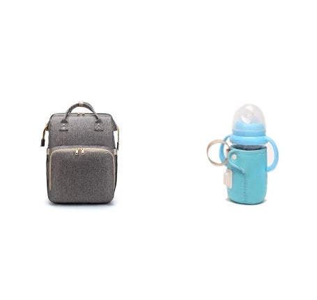 Versatile baby changing backpack with USB charging port and folding portable bed