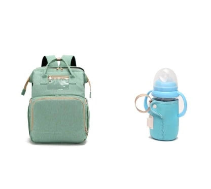 Versatile baby changing backpack with USB charging port and folding portable bed