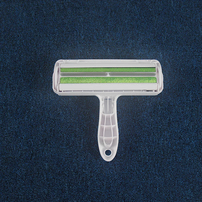 Blue pet hair removal comb with ABS plastic body and roller bristles for furniture cleaning