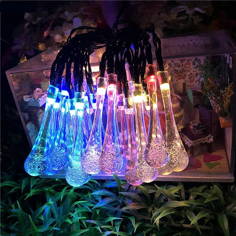 LED outdoor water drops solar string lights with bubble drop pendants on 6.5m cable, solar panel and ground spike included