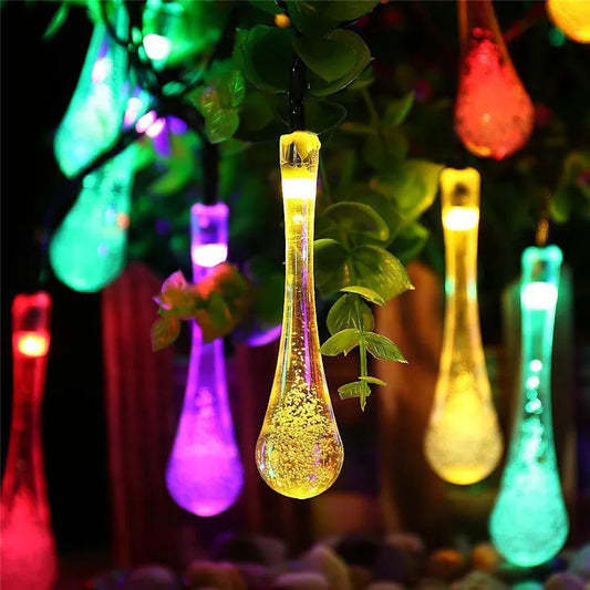 LED outdoor water drops solar string lights with bubble drop pendants on 6.5m cable, solar panel and ground spike included