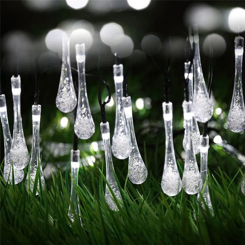 LED outdoor water drops solar string lights with bubble drop pendants on 6.5m cable, solar panel and ground spike included