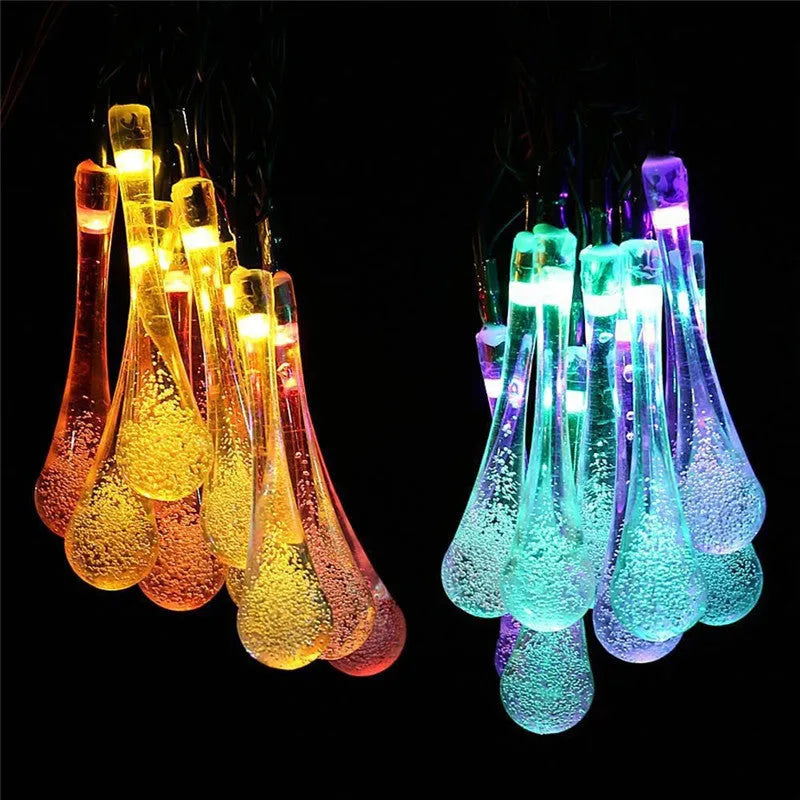 LED outdoor water drops solar string lights with bubble drop pendants on 6.5m cable, solar panel and ground spike included