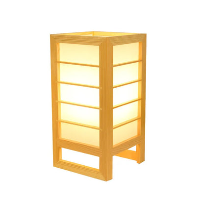 Simple solid wood bedside lamp with a natural bamboo wood base and a push-button switch on the cord.