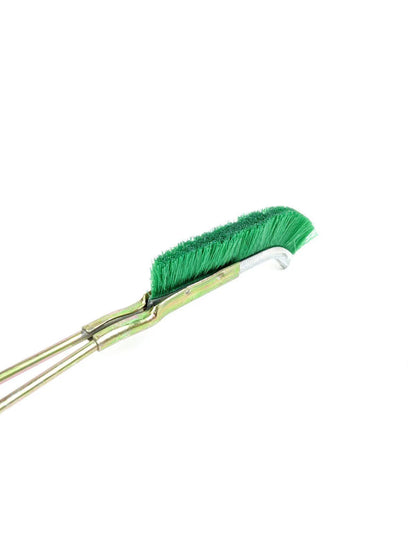 Green elbow-shaped nylon wire brush with metal handle for rust removal and appliance cleaning