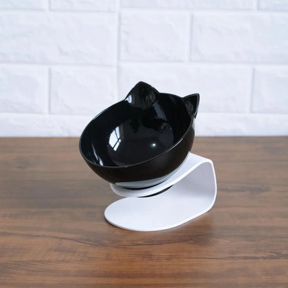 An inclined cat food bowl with a transparent design and a sturdy base, providing a comfortable and hygienic dining experience for your feline friend.