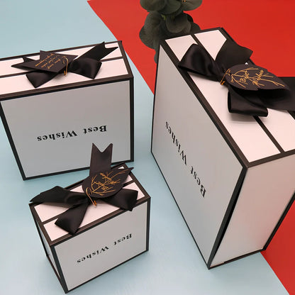 White clamshell gift box for lipstick cosmetics with book-style opening in three size options