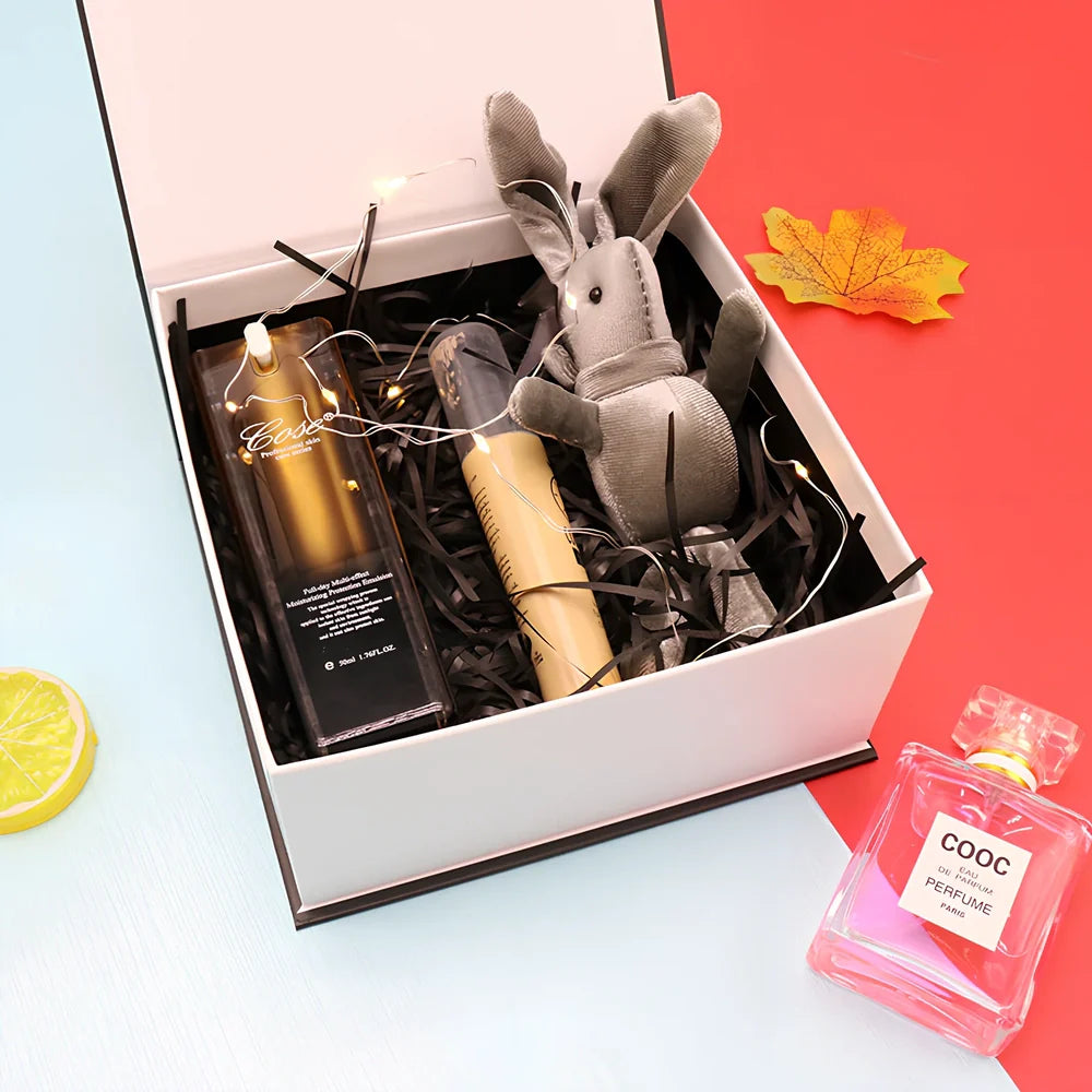 White clamshell gift box for lipstick cosmetics with book-style opening in three size options