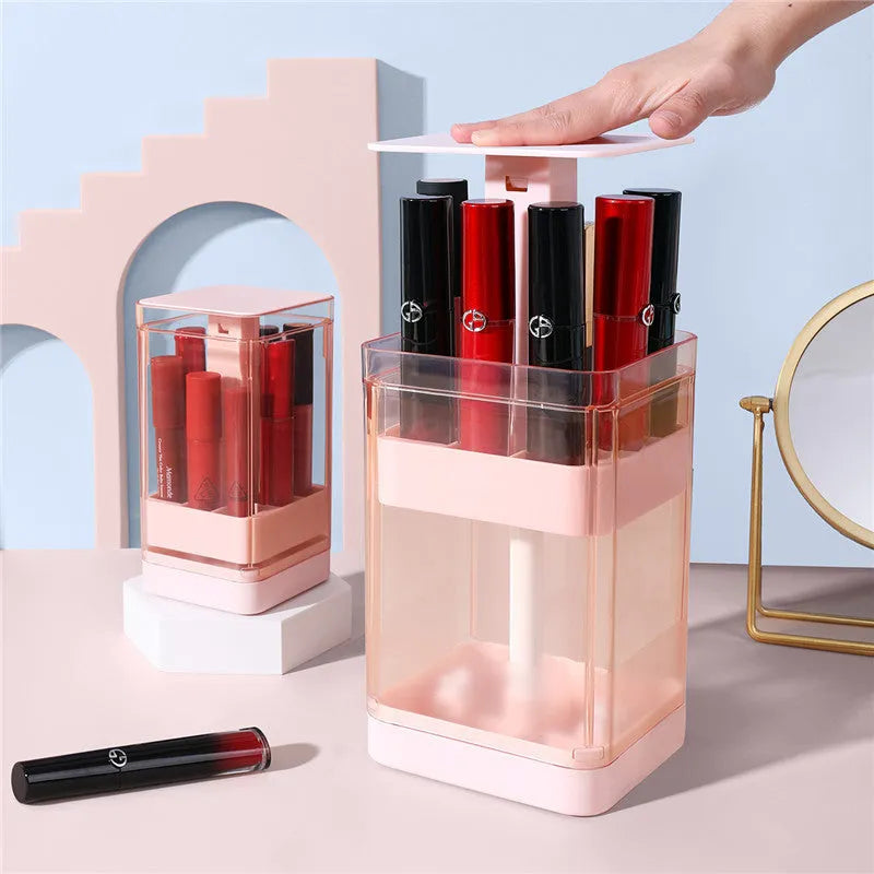 Press-lift lipstick storage box in pink or white, holding 8 or 12 lipsticks, dimensions 8.3x8.3x16.3cm or 11.9x11.9x13.2cm