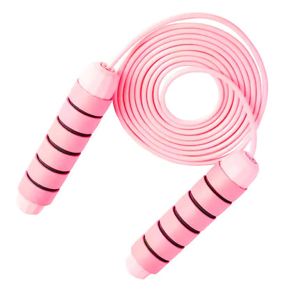 Pink and grey skipping rope with weighted handles and adjustable length mechanism for fitness training