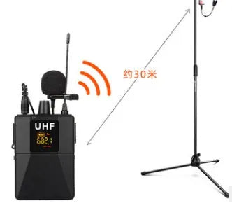 Little Bee X3 black wireless lavalier microphone and charging case on a table