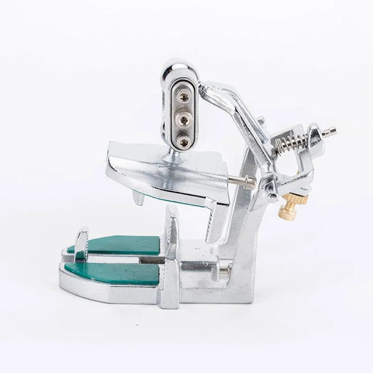 Korean jaw dental articulator with three adjustable settings on a dental model