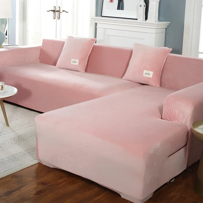 Silver Fox Velvet elastic sofa cover stretched over grey sofa showing fitted appearance