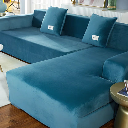 Silver Fox Velvet elastic sofa cover stretched over grey sofa showing fitted appearance