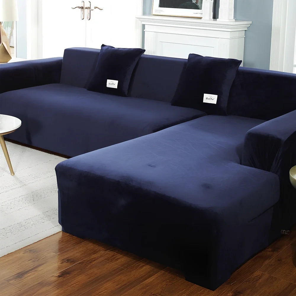 Silver Fox Velvet elastic sofa cover stretched over grey sofa showing fitted appearance