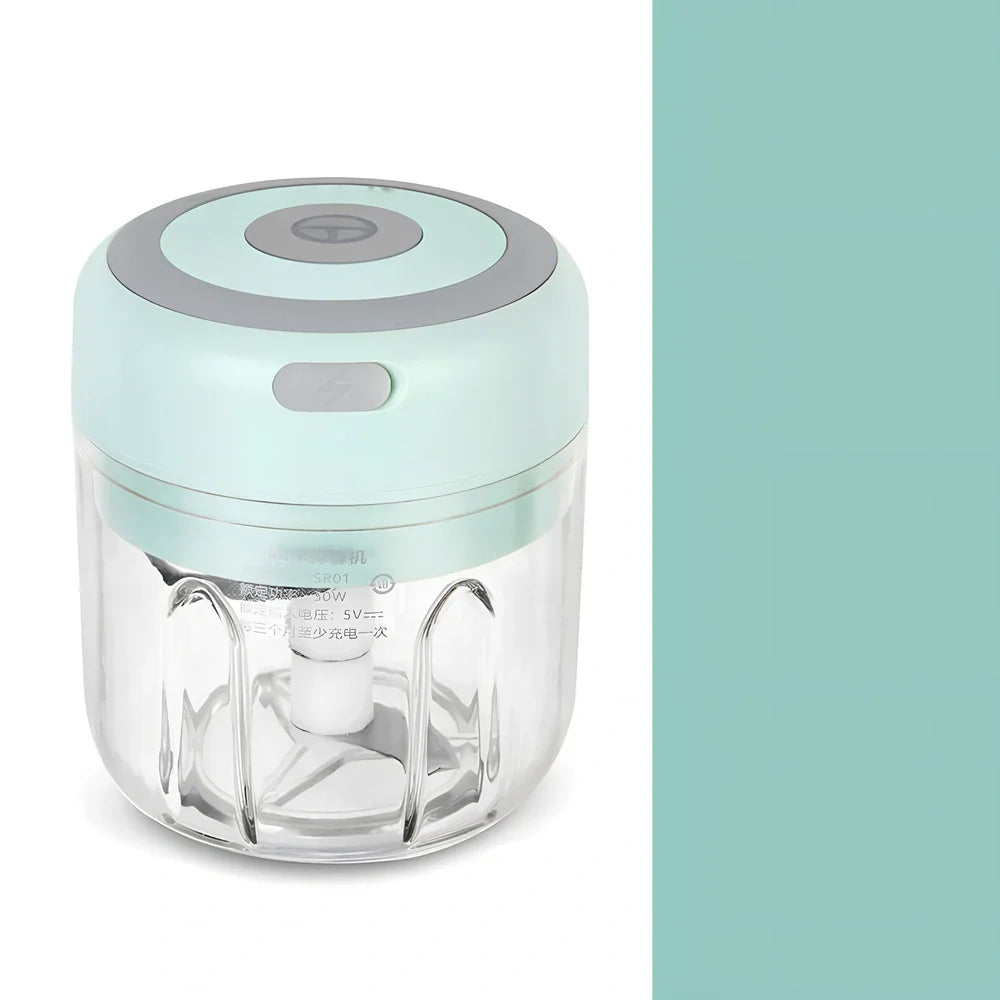 Mini electric garlic chopper with stainless steel blades in green, pink, or white with USB charging cable