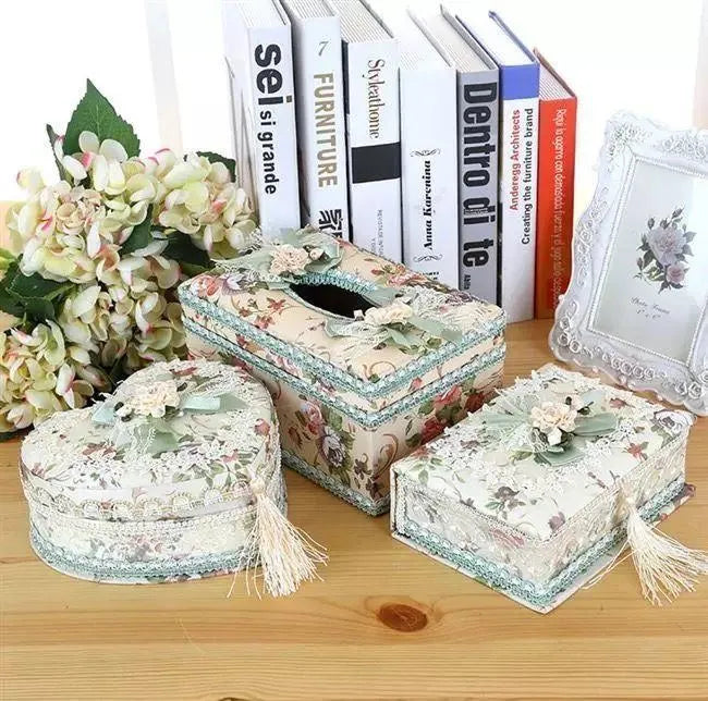 Ceramic decorative tissue box in bright pink, also used for jewellery storage.