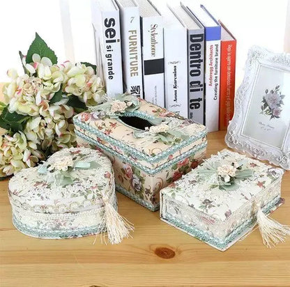 Ceramic decorative tissue box in bright pink, also used for jewellery storage.