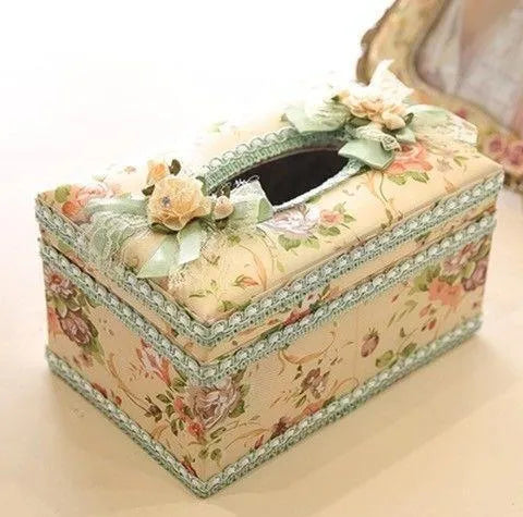 Ceramic decorative tissue box in bright pink, also used for jewellery storage.