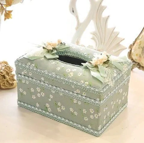 Ceramic tissue box for home decor, multi-use as a jewellery box, earrings and ring storage box, with a choice of bright apricot, green, or bright pink colours. A decorative and practical conventional tissue box designed to suit a range of room settings.
