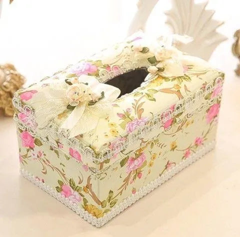 Ceramic decorative tissue box in bright pink, also used for jewellery storage.
