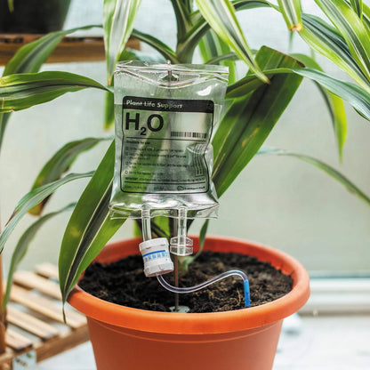 Drip irrigation watering bag for indoor plants, featuring a slow-release water system and compact, sustainable design.