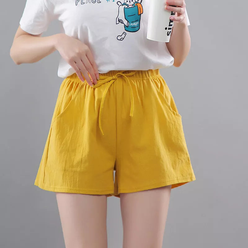Women's washed cotton solid color shorts with loose fit and middle waist