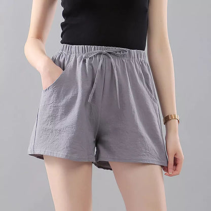 Women's washed cotton solid color shorts with loose fit and middle waist
