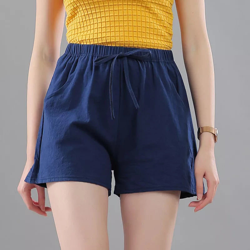 Women's washed cotton solid color shorts with loose fit and middle waist