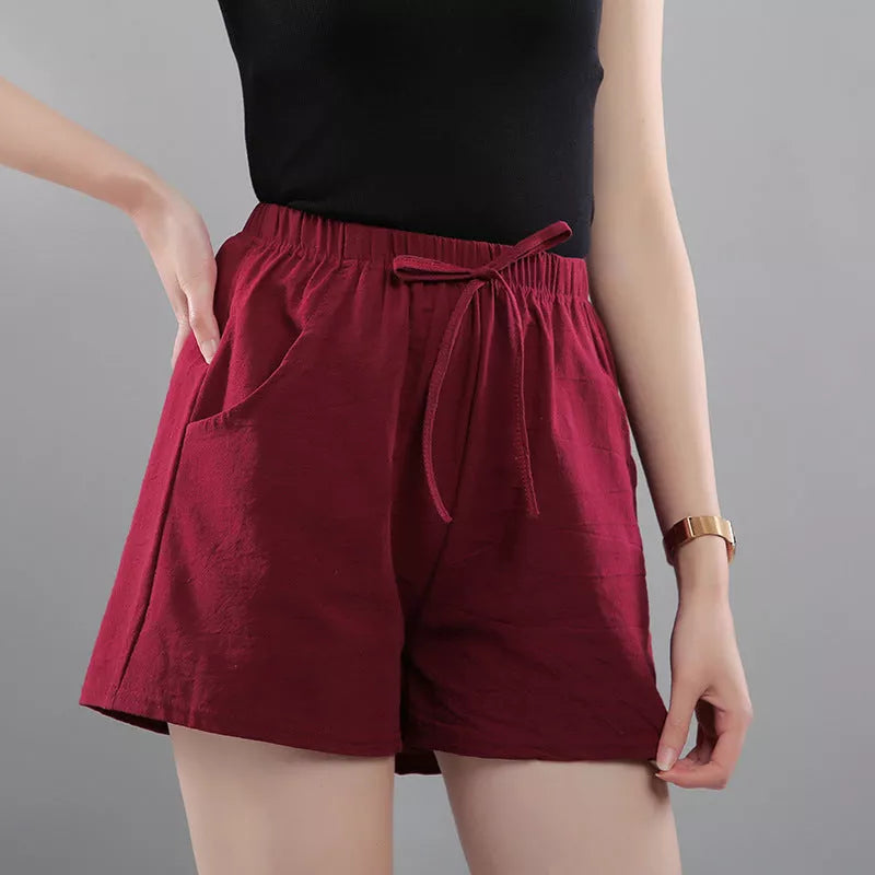 Women's washed cotton solid color shorts with loose fit and middle waist