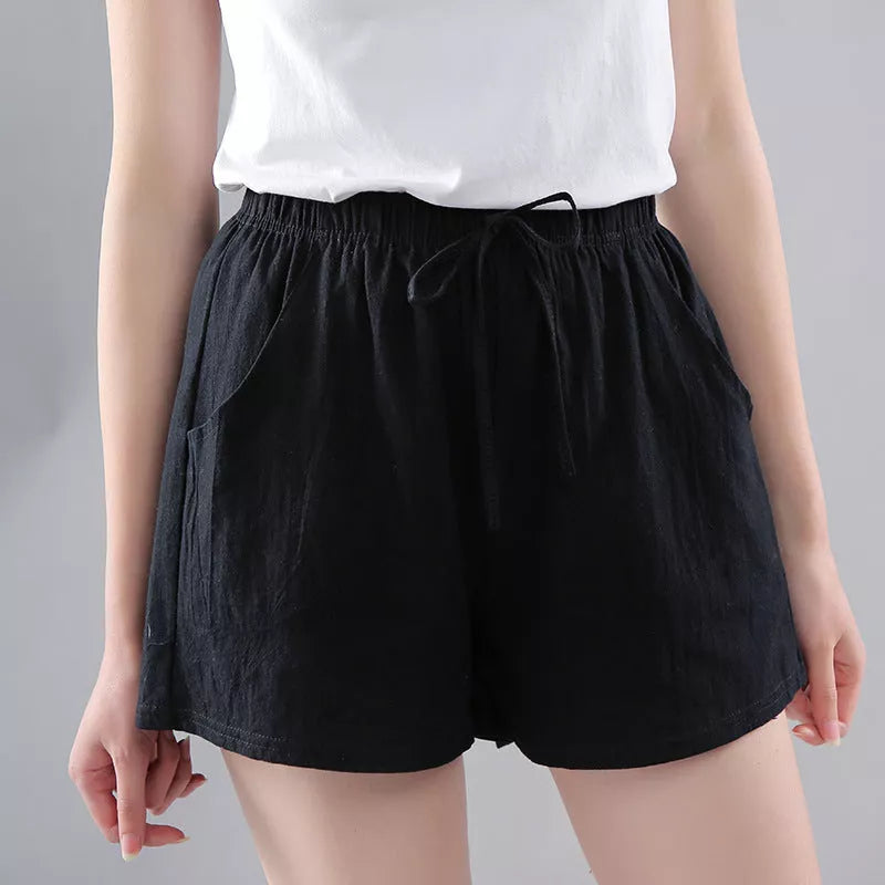 Women's washed cotton solid color shorts with loose fit and middle waist