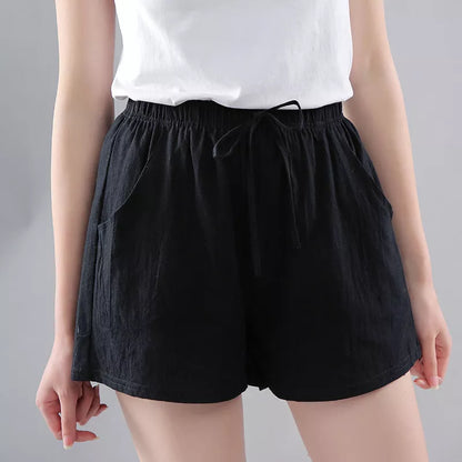 Women's washed cotton solid color shorts with loose fit and middle waist