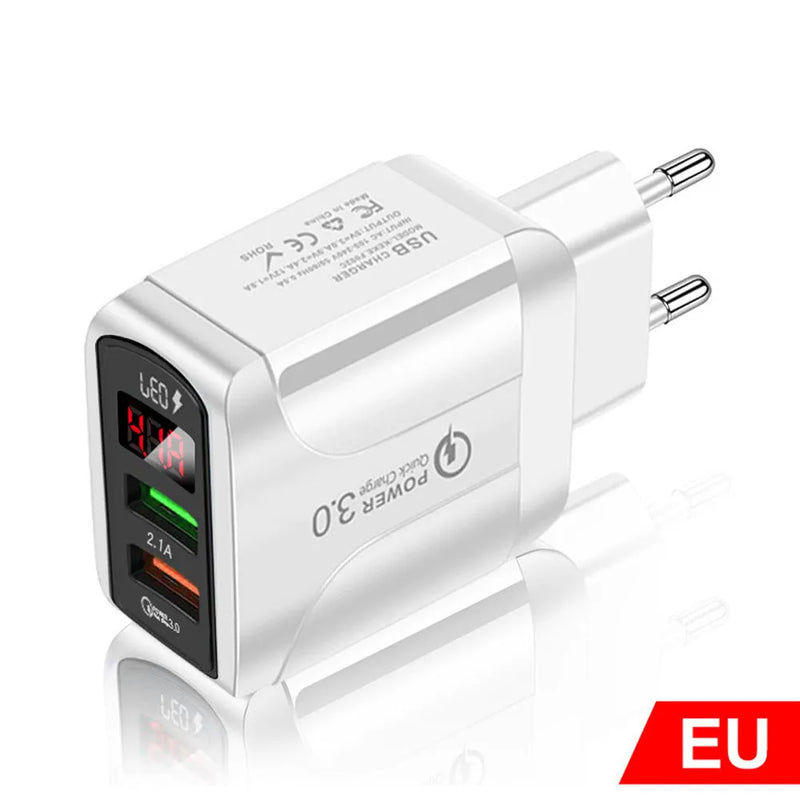 Digital display travel charger for smartphones with fast charging up to 3000mA, suitable for European EU, British UK, and American US electrical outlets, available in black and white colours