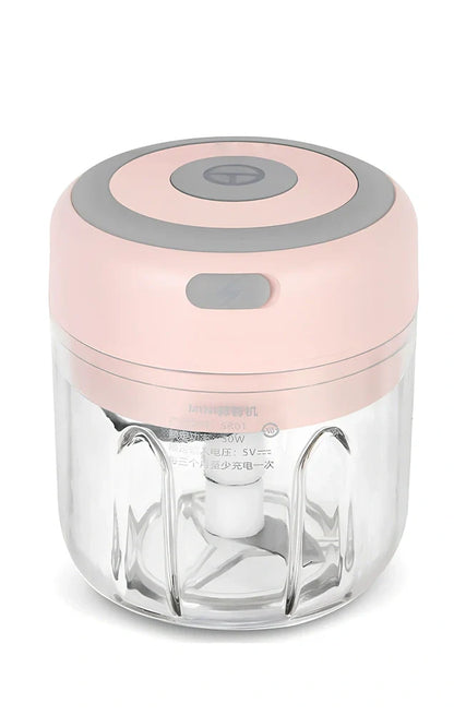 Mini electric garlic chopper with stainless steel blades in green, pink, or white with USB charging cable